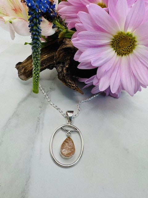 Sterling Silver Rough Rose Quartz Circular Pendant